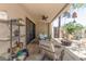 Relaxing covered patio with ceiling fan and outdoor seating, perfect for entertaining at 9389 N 87Th Way, Scottsdale, AZ 85258