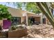Back patio features desert landscaping and ample space for outdoor seating and relaxation at 9389 N 87Th Way, Scottsdale, AZ 85258