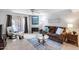 Relaxing living room with fireplace and a comfortable seating arrangement at 9450 N 94Th Pl # 116, Scottsdale, AZ 85258