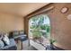 Relaxing covered patio offers a shaded area with nice views of the landscaped yard at 9450 N 94Th Pl # 116, Scottsdale, AZ 85258