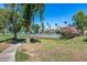 Enjoy a match at the community tennis court surrounded by lush landscaping and mature trees at 9450 N 94Th Pl # 116, Scottsdale, AZ 85258