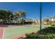 Community tennis courts offering well-maintained playing surfaces, surrounded by lush landscaping at 9450 N 94Th Pl # 116, Scottsdale, AZ 85258