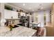 Modern kitchen featuring granite countertops, stainless steel appliances and barstool seating at 963 S Colonial Dr, Gilbert, AZ 85296