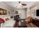 Inviting living room featuring comfortable seating, wood floors, and a cozy ambiance at 963 S Colonial Dr, Gilbert, AZ 85296