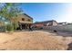Extensive backyard with a covered patio, offering abundant space for outdoor activities and personalized landscaping at 12026 W Salter Dr, Sun City, AZ 85373