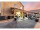 Expansive backyard with a covered patio, perfect for outdoor gatherings and enjoying the serene surroundings at 12026 W Salter Dr, Sun City, AZ 85373