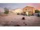 Spacious backyard with a covered patio area, providing ample room for outdoor living and recreation at 12026 W Salter Dr, Sun City, AZ 85373