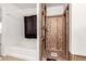Bathroom featuring separate bathtub and shower stall under construction at 12026 W Salter Dr, Sun City, AZ 85373
