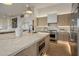 Bright, modern kitchen with an island, stainless steel appliances, and modern cabinetry at 13631 E Windrose Dr, Scottsdale, AZ 85259