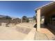 Spacious outdoor living in backyard featuring a pergola and decorative stone work at 1390 E Jasper Dr, Gilbert, AZ 85296