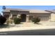 Charming single-story home featuring a well-manicured lawn and a two-car garage at 1390 E Jasper Dr, Gilbert, AZ 85296