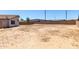 Large bare backyard enclosed by block wall, perfect for custom landscaping and outdoor living at 1501 E Sunland Ave, Phoenix, AZ 85040