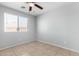 Bright and airy bedroom with a large window and tile floors, creating a comfortable living space at 1501 E Sunland Ave, Phoenix, AZ 85040