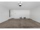Spacious garage equipped with utility connections, lighting, and storage space at 1501 E Sunland Ave, Phoenix, AZ 85040