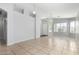 Bright living area features neutral paint, tile floors, and multiple windows for natural light at 1501 E Sunland Ave, Phoenix, AZ 85040