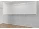 Spacious walk-in closet with ample shelving for storage, providing organization and convenience at 1501 E Sunland Ave, Phoenix, AZ 85040