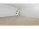 Bright bedroom with neutral carpet and a walk-in closet offers plenty of space at 15349 W Cottontail Ln, Surprise, AZ 85387
