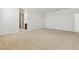 Large carpeted bedroom with walk-in closet and ample space for various furniture arrangements at 15349 W Cottontail Ln, Surprise, AZ 85387