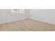 Bedroom with carpet flooring, window with blinds and white trim at 15365 W Cottontail Ln, Surprise, AZ 85387