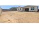 This expansive backyard, enclosed by a block fence, awaits personalized landscaping and design at 15429 W Cottontail Ln, Surprise, AZ 85387