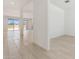 Bright open living room with neutral walls, tiled floors, and ample sunlight at 15429 W Cottontail Ln, Surprise, AZ 85387