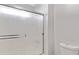 Bathroom with glass enclosed shower and white toilet at 1673 S 171St Dr, Goodyear, AZ 85338
