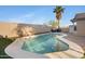 Backyard featuring a sparkling pool perfect for relaxation and entertainment at 1673 S 171St Dr, Goodyear, AZ 85338