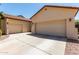 This home has three garages, a two-car and a single-car garage with plenty of driveway space at 17937 W Westpark Blvd, Surprise, AZ 85388