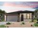 Charming single-story home featuring a two-car garage and low-maintenance landscaping at 19195 N Los Gabrieles Way, Maricopa, AZ 85138