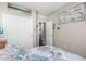 Well decorated bedroom featuring a queen bed and closet with bifold doors at 20858 E Sonoqui Dr, Queen Creek, AZ 85142
