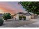 Beautiful single-story home with low-maintenance desert landscaping and an attached garage at 20858 E Sonoqui Dr, Queen Creek, AZ 85142