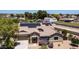 Aerial shot of home with solar panels, desert landscaping, and privacy walls at 2101 S 167Th Dr, Goodyear, AZ 85338