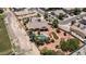 Expansive backyard with a beautiful pool, lush landscaping, and a well-maintained lawn area at 2101 S 167Th Dr, Goodyear, AZ 85338