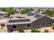 Solar panels adorn the roof of a home in a Gathering-friendly community with mountain views at 2101 S 167Th Dr, Goodyear, AZ 85338