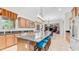 Gourmet kitchen boasting granite countertops, an island with seating, and stainless steel appliances at 2101 S 167Th Dr, Goodyear, AZ 85338