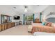 Large main bedroom with carpet, decoratively trimmed furniture, and a ceiling fan at 2101 S 167Th Dr, Goodyear, AZ 85338