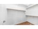 Walk-in closet with carpet and metal shelving and rods at 2101 S 167Th Dr, Goodyear, AZ 85338