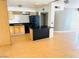 Modern kitchen featuring granite countertops, stainless appliances and an island at 2103 W Missouri Ave, Phoenix, AZ 85015