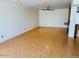 Bright and open living space featuring wood flooring and a modern ceiling fan at 2103 W Missouri Ave, Phoenix, AZ 85015