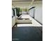 Covered patio with concrete flooring and block accents, ideal for outdoor living at 2103 W Missouri Ave, Phoenix, AZ 85015