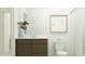 Modern bathroom featuring a dark wood vanity, a white countertop, and a mirror with modern art at 23073 E Saddle Way, Queen Creek, AZ 85142