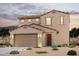Charming two-story home with a desert-landscaped yard and a tile roof at 2583 E Music Mountain Ave, Apache Junction, AZ 85119