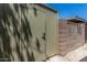 Exterior image of the home's storage shed, enclosed by a cinderblock fence, provides secure outdoor storage at 2645 W Elm St, Phoenix, AZ 85017