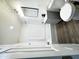 A full bathroom featuring a shower-tub combination, a vanity and modern fixtures at 2724 W Highland Ave, Phoenix, AZ 85017