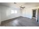 A bright bedroom with neutral colors and modern ceiling fan fixture at 2724 W Highland Ave, Phoenix, AZ 85017