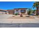 Charming single-story home featuring desert landscaping, a two-car garage, and a covered entry at 3114 E Capricorn Way, Chandler, AZ 85249