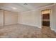 Spacious living room with tile flooring, built-in cabinetry, and neutral color palette at 3114 E Capricorn Way, Chandler, AZ 85249