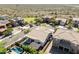 A neighborhood of single Gathering homes is next to a green space in a desert landscape at 31311 N 138Th Ave, Peoria, AZ 85383