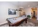 Game Room with a pool table and a decorative overhead light at 31311 N 138Th Ave, Peoria, AZ 85383
