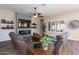 Relaxing living room with modern ceiling fan and plantation shutters for privacy at 31311 N 138Th Ave, Peoria, AZ 85383